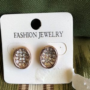 New never worn. Faux stone studs. Gold tone